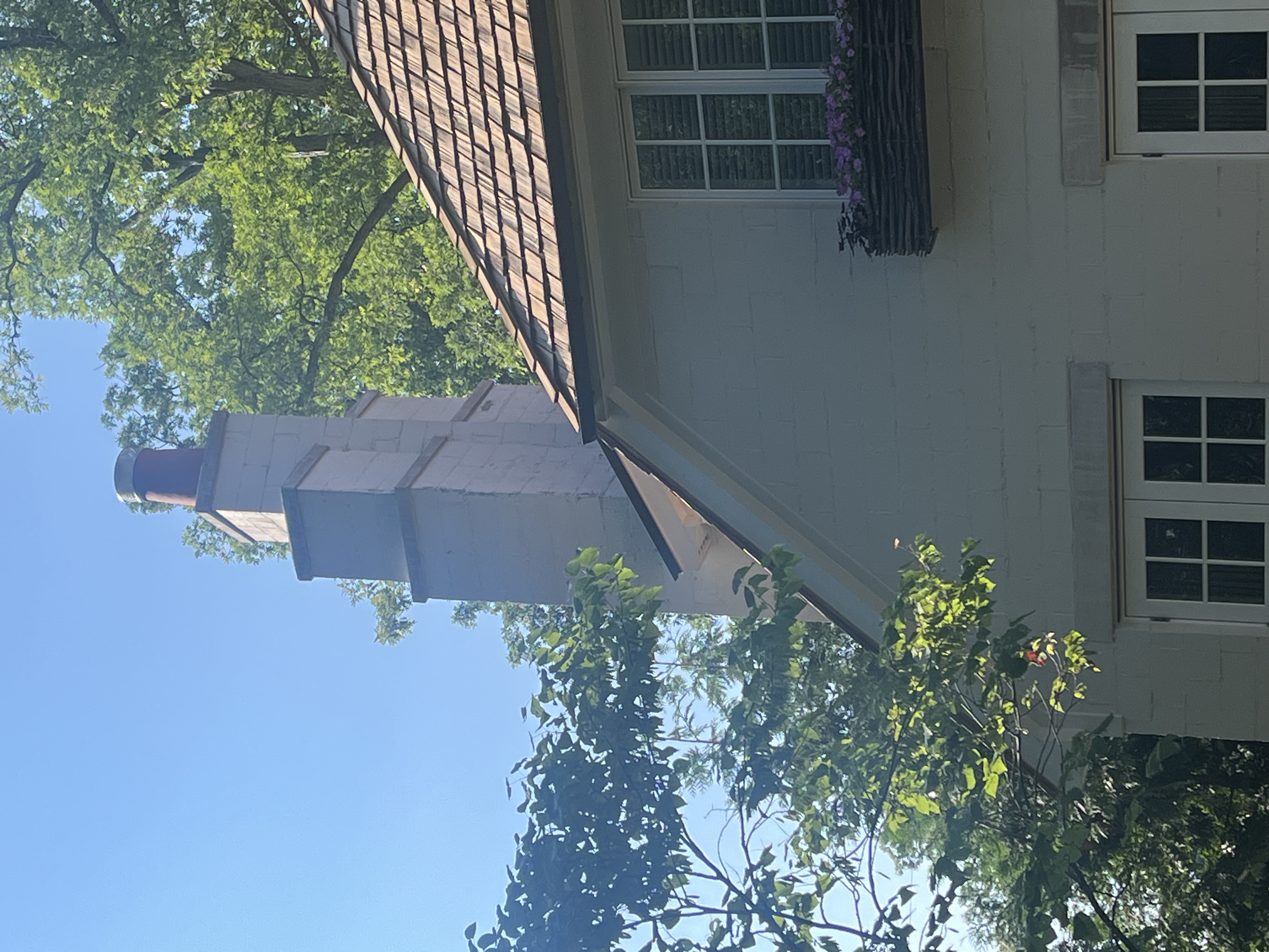 Chimney on white luxury home