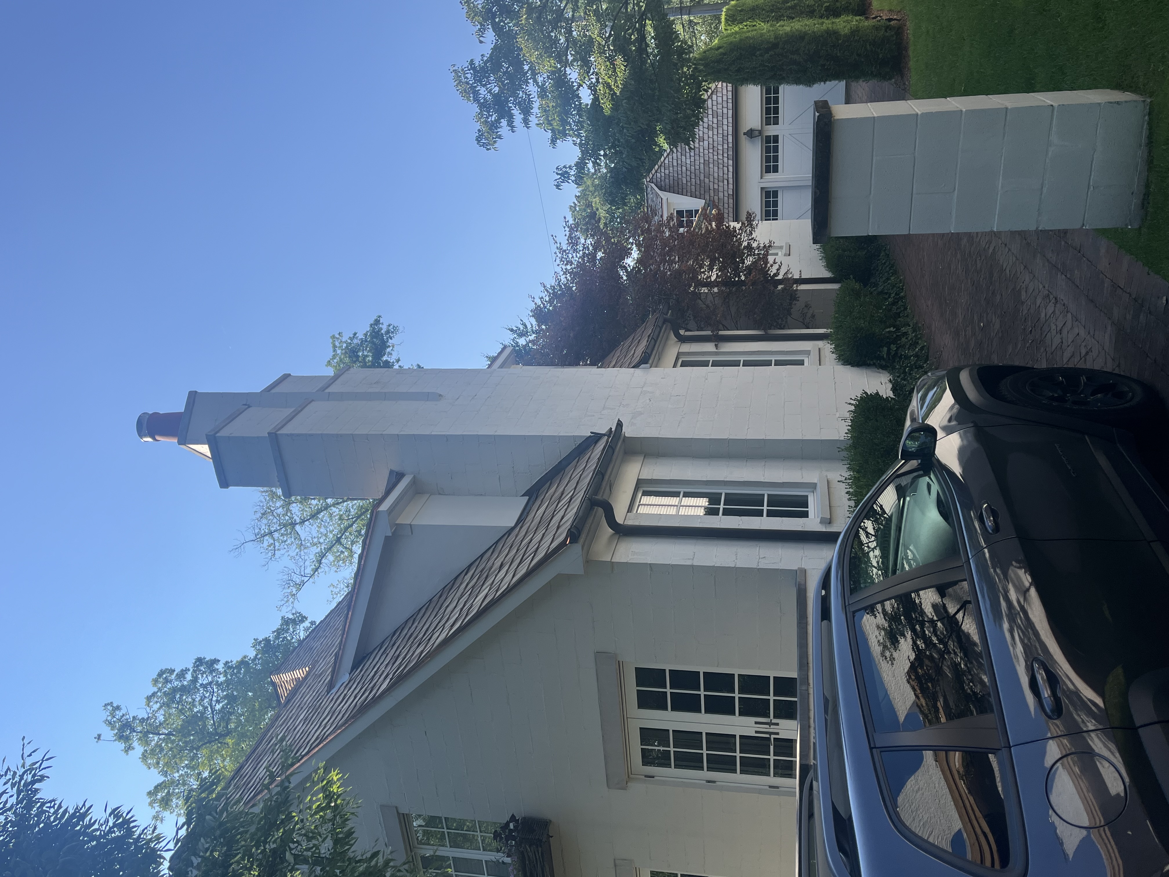 White exterior chimney on residential home